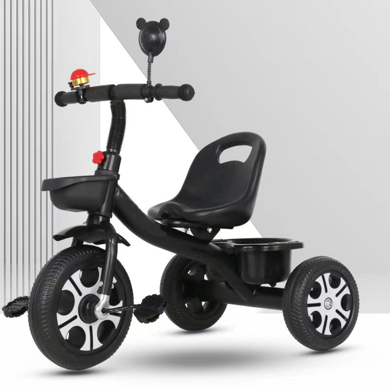 kids tricycle with a bell and basket